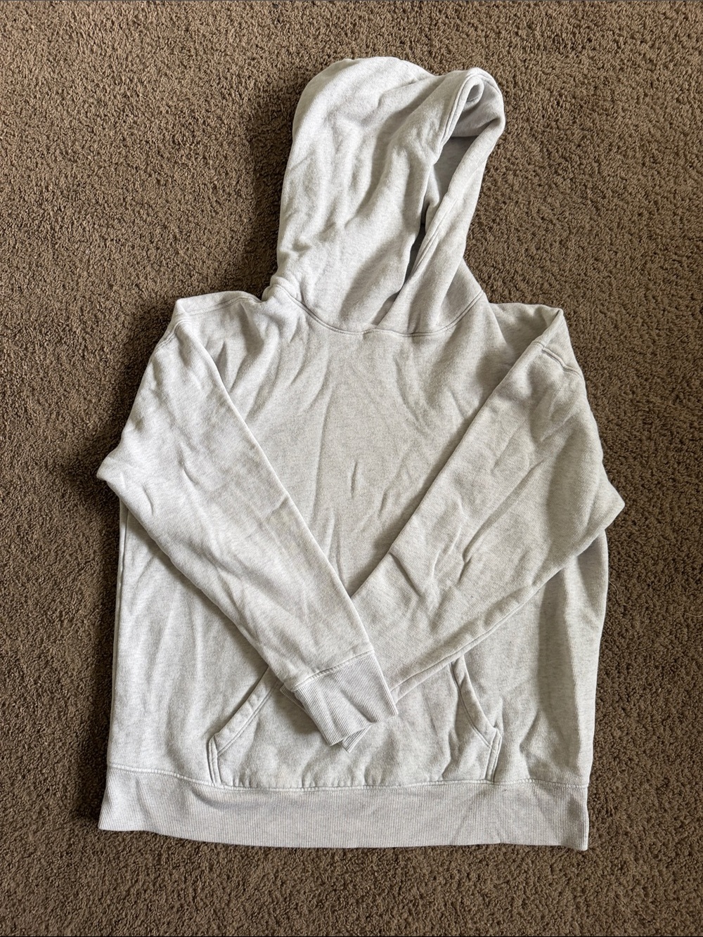 Woman’s light grey hoodie